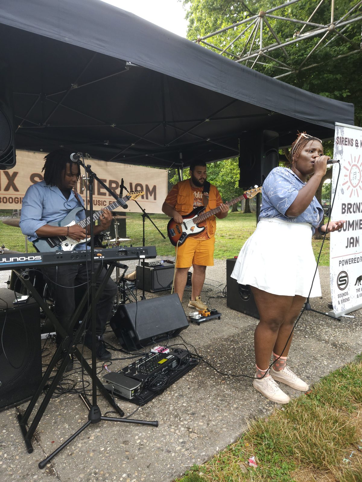 Live music and neighbors gathered in the park at the Oscar Comras Memorial Mall, Bronx Park East